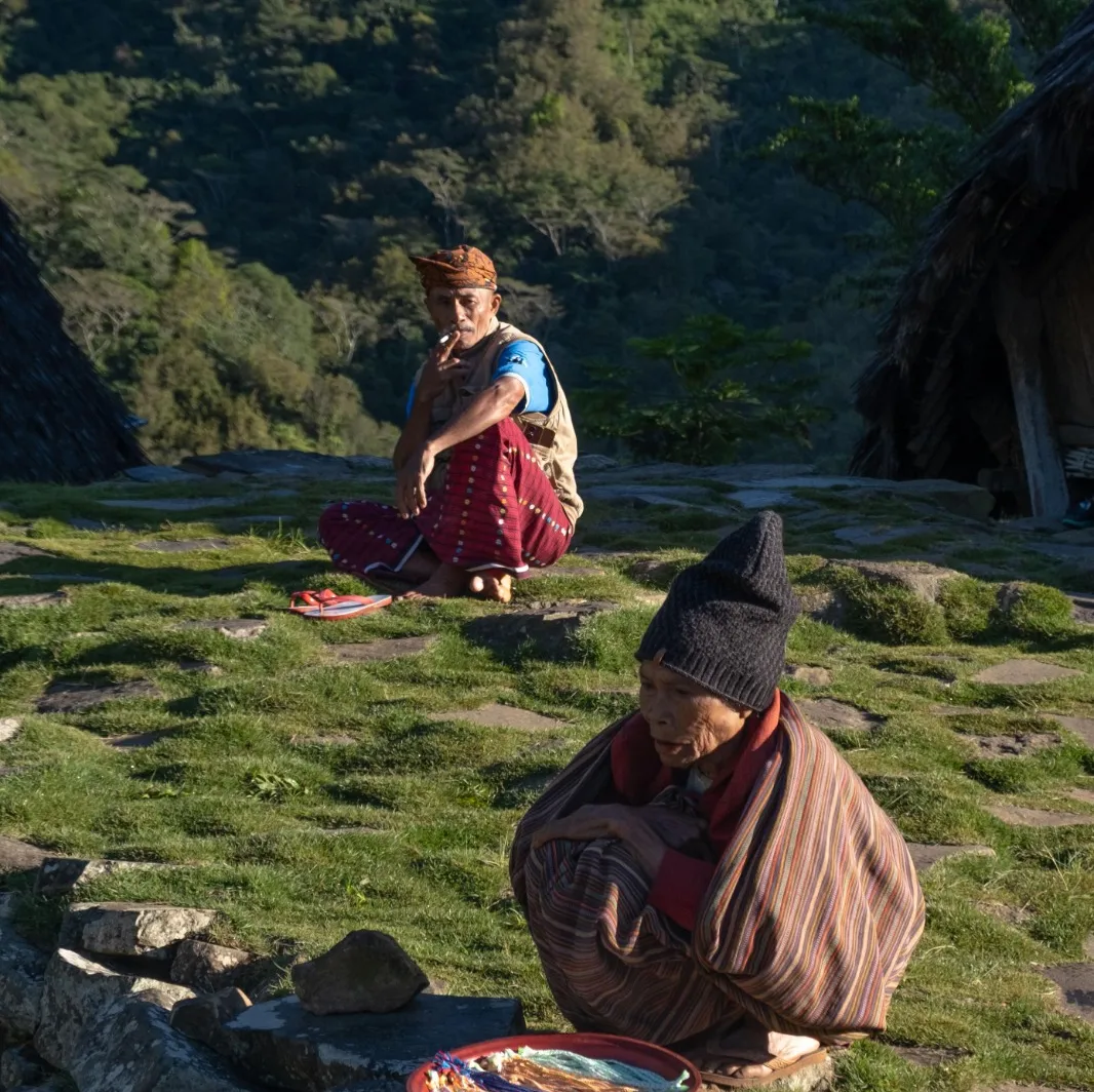 Villagers in traditional dress at a Flores village
