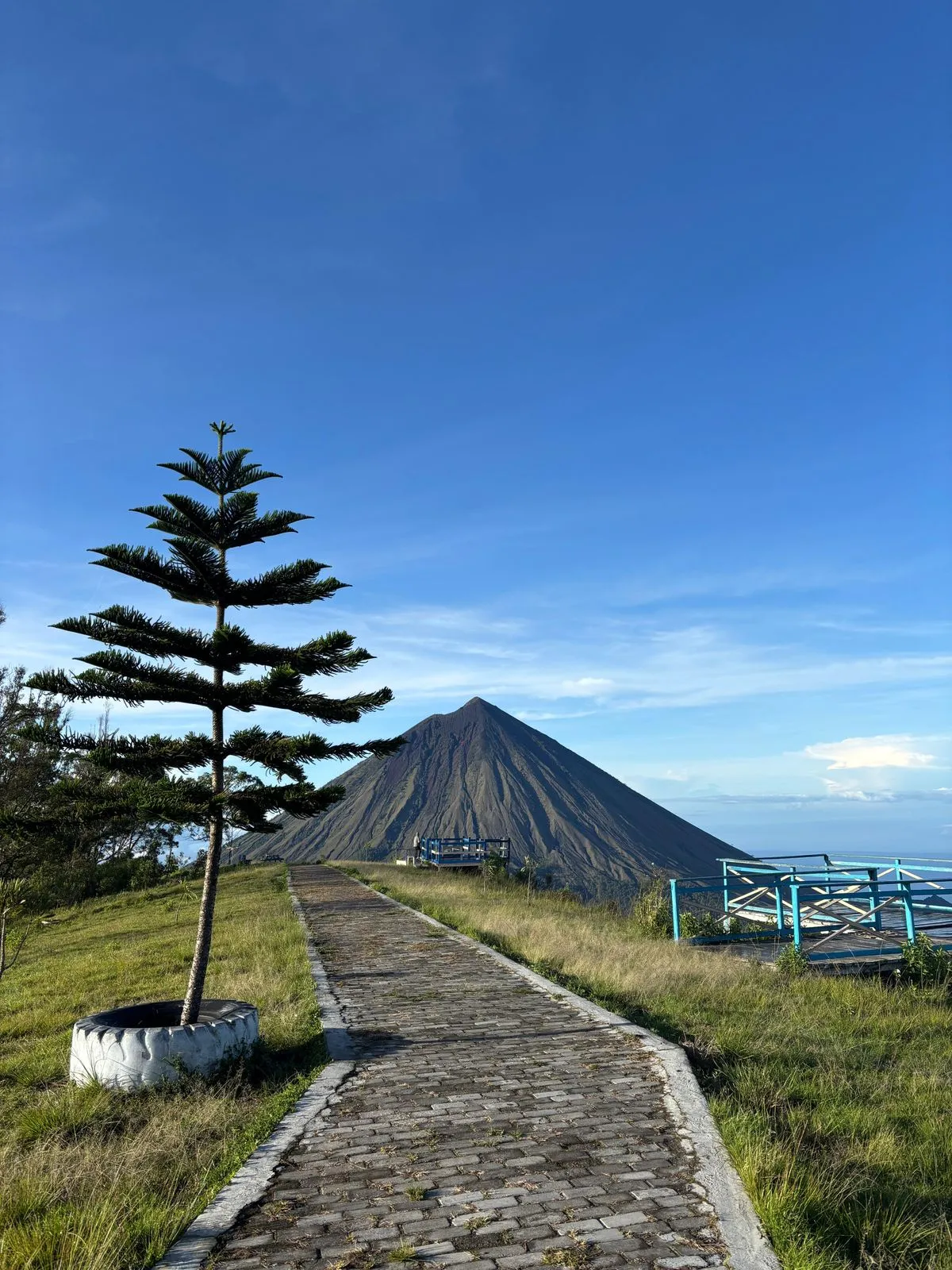 View from Wolobobo hill toward a volcano over the Bajawa valley